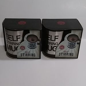 TWO! self stirring coffee mugs great entertainment